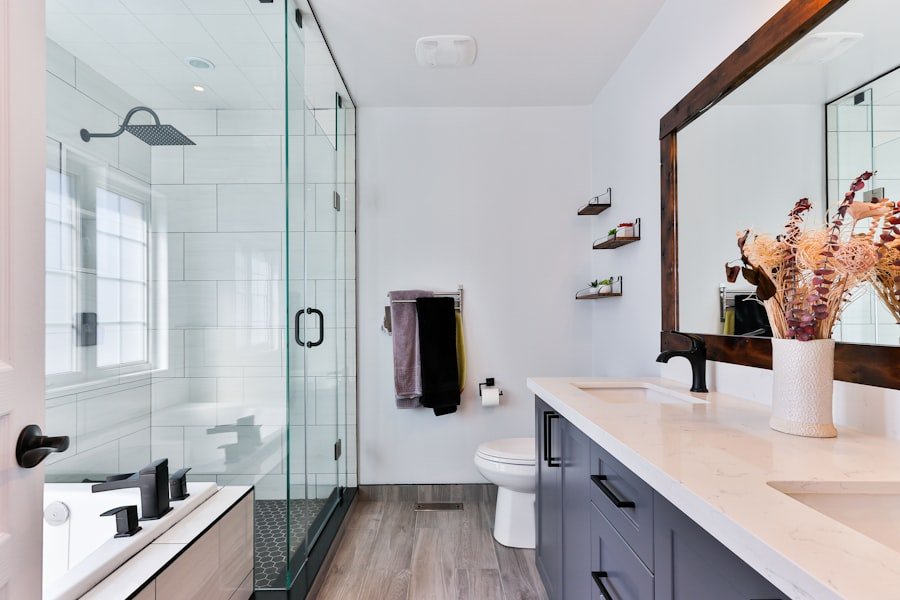 Bathroom with glass shower and navy vanity